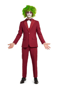 A person dressed in a Suitmeister Beetlejuice Groom costume, featuring a burgundy suit, green wig, and clown-like face paint, standing with arms open against a white background.