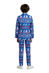 A child is turned away, dressed in the Suitmeister Christmas Blue Nordic suit adorned with festive white and red patterns featuring snowflakes and reindeer. The ensemble is complemented by white shoes, all set against a simple white background.