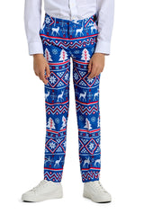 The image features someone dressed in a Suitmeister Christmas Blue Nordic suit, adorned with playful patterns of white reindeer, snowflakes, and trees. They are also wearing a white shirt and sneakers. The image is cropped just below their shoulders.