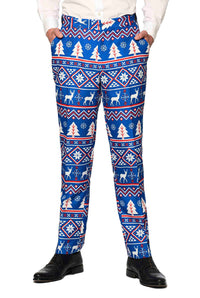 A person is wearing the Christmas Suit Blue Nordic by Suitmeister, featuring a winter-themed pattern with reindeer, snowflakes, and trees. They are also wearing black shoes and only the lower half of their body is visible.