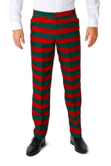 A person dressed in the Santa's Elf Green - Christmas Elf Suit by Suitmeister stands with their hands at their sides, featuring red and green striped pants. They are also sporting a white shirt and black shoes against a plain white background.