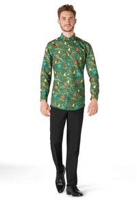 A man wearing a Christmas Green Tree Shirt from Suitmeister, featuring a jungle-themed design with colorful animals and foliage, paired with black pants and shoes, standing against a white background.