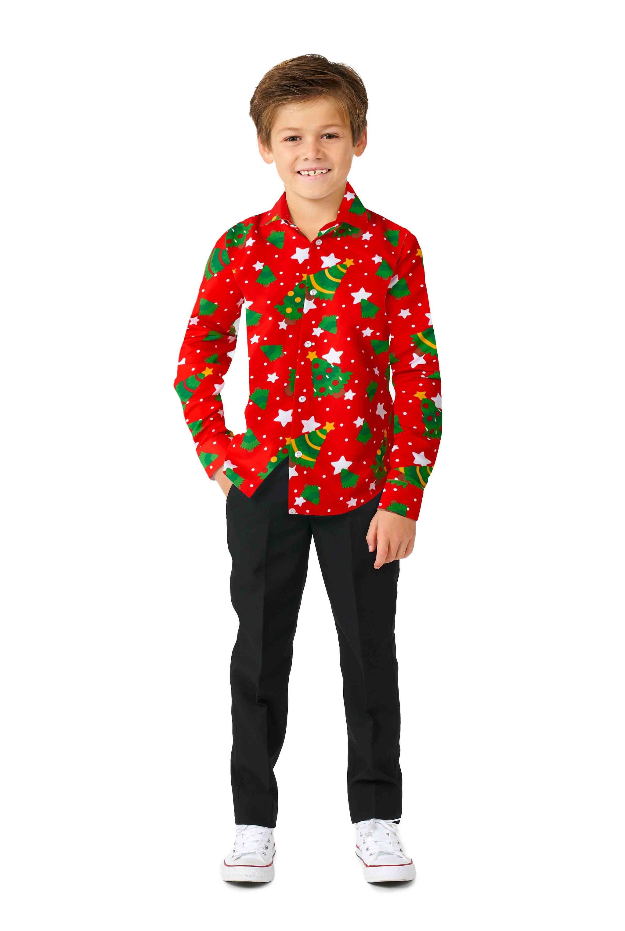 A smiling child stands against a plain white background, wearing the Suitmeister Christmas Trees Stars Red shirt, paired with black pants and white sneakers.