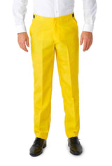 A person wearing the Elf™ - Christmas Suit Elf pants in bright yellow by Suitmeister is standing against a plain background, paired with a white shirt and black shoes. The image highlights the vibrant lower half of the ensemble.