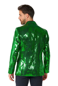 A man wearing the eye-catching Sequins Blazer Green by Suitmeister is facing away. The reflective green jacket is paired with dark pants against a white background.