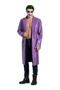 A person dressed as a comic book villain stands confidently, wearing the Joker Coat by Suitmeister. They are clad in dark pants and boots, with their face painted white with bright red lips and dark eyes, topped off with short green hair.