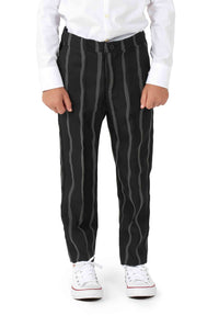 A person is wearing an Oversized Pinstripe Black by Suitmeister featuring black pants with vertical gray stripes, white sneakers, and a white long-sleeve shirt. The image emphasizes the lower half of the body.