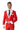 A man wearing the Suitmeister Santa Faux Fur - Santa Christmas suit is dressed in a festive, holiday-themed outfit with red fabric and white trim. He complements the look with a white shirt and black tie, smiling warmly with his short hair styled neatly.