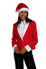 A person dressed in a Suitmeister Santa Faux Fur - Christmas blazer, complete with a red Santa hat and red jacket adorned with white fur trim. They are also wearing a white shirt and black pants, standing against a plain white background.