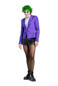 A person wearing The Joker Jacket by Suitmeister, paired with black shorts and dotted tights, along with green hair and clown smile face paint, stands against a white background.