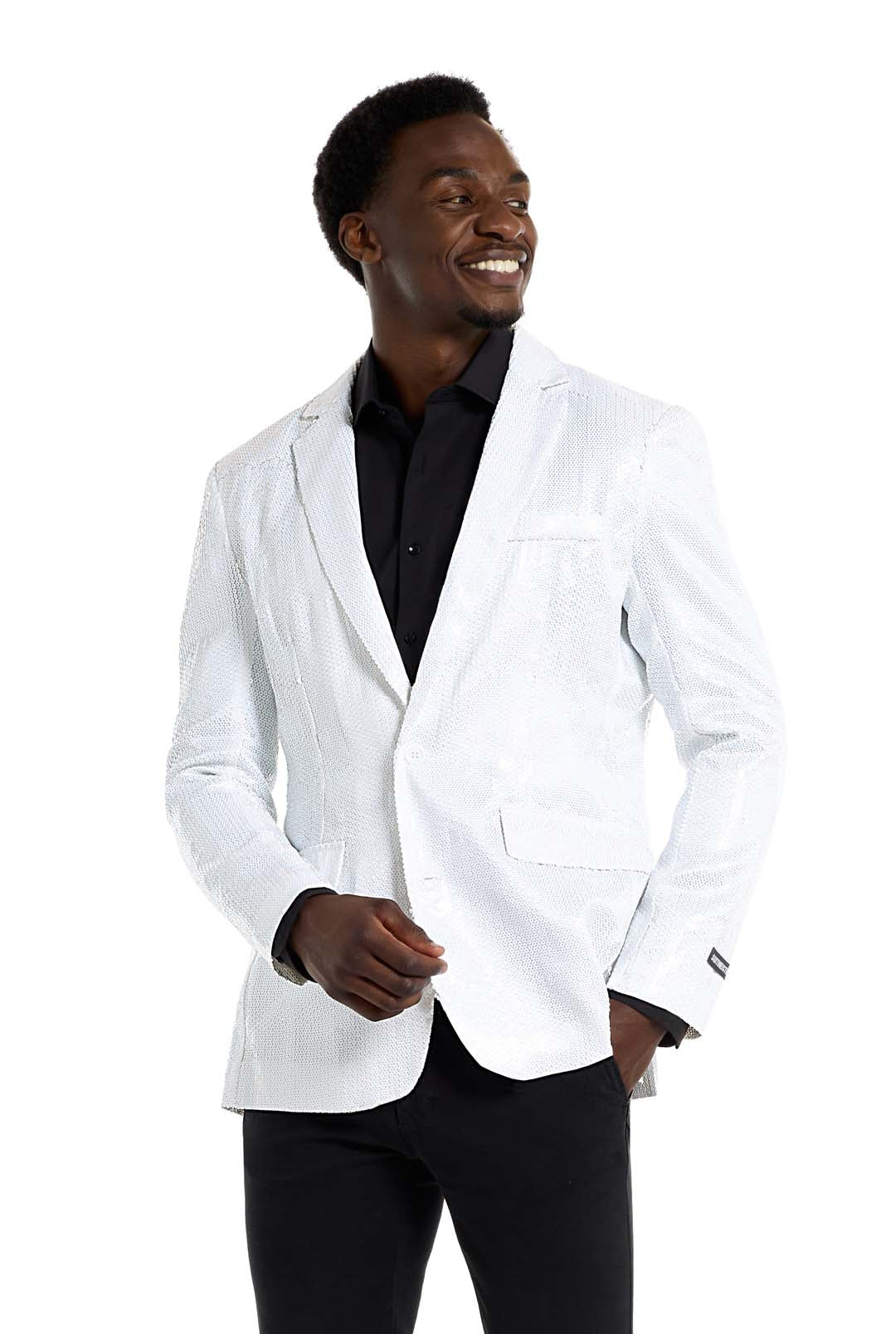 A man smiles and poses in a Suitmeister Sequins Blazer White over a black shirt and pants, with his hands clasped in front of him against a plain white background.